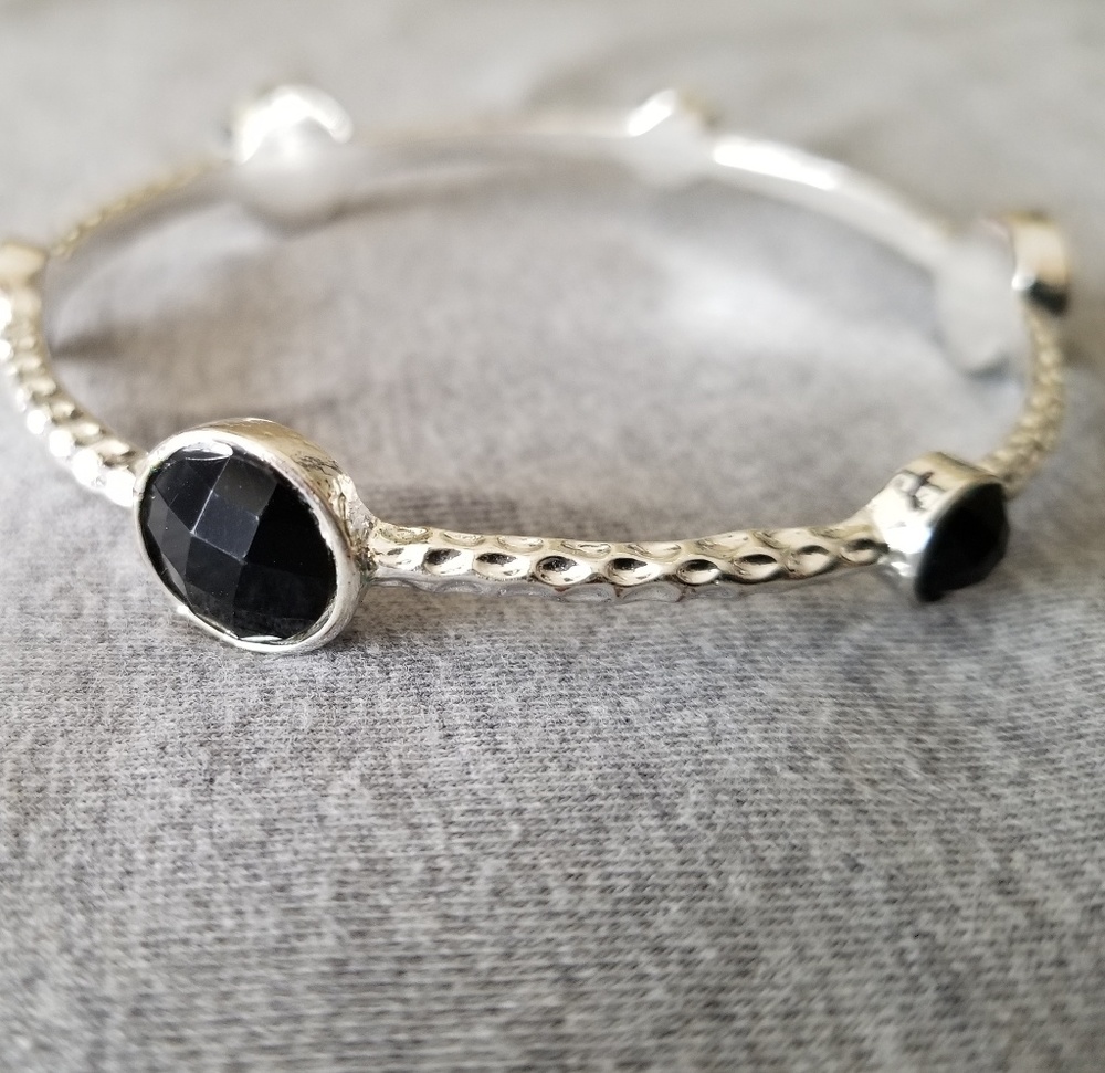 Silver bracelet with black accent gems